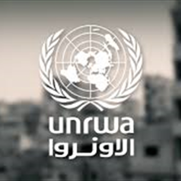 What are the implications of UNRWA’s decision to partially postpone the salaries of its employees on the Palestinian refugees?